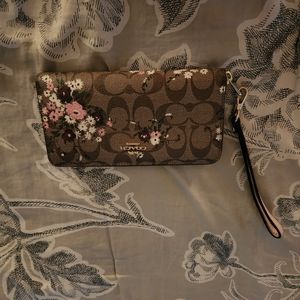 Brown with muliti color flowers wristlet